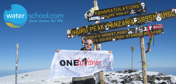 Our clients signatures on this flag and contributions to www.thewaterschool.org carried me to 19,341 ft.